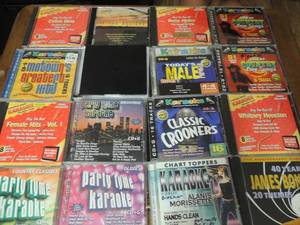 lot 89 image: Karaoke CDs- James Bond, Broadway, country classics, gospel, Whitney Houston