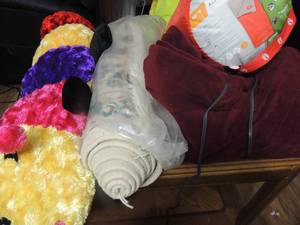 lot 96 image: Twin size heating blanket (works), 12 caterpillar stuffed animal, New Coleman Alpine sleeping bag, and 3 hall rug new