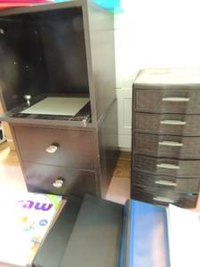 lot 99 image: Two 3 drawer stackable desk storage bins, 2 plastic 20 file expandable files, pencil bags, double stack cabinet top piece has door needs repair bottom 12 has 2 drawers 29x14, sticky notes, markers, writing paper, folders, binders