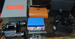 lot 100 image: Sports Glass 2.5 x Binoculars in blue football box, Sears brand binoculars in black case Montgomery Wards Binoculars 7x 35 ZCF Art.no67-7009 in gray box