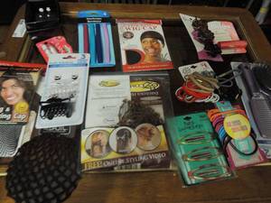 lot 105 image: Hair accessories- scrunches, rubber bands, hair caps, lip gloss, mini clips, chap stick and more. Ar least 2 of everything