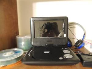 lot 119 image: NEW 7 swivel screen DVD player not in box