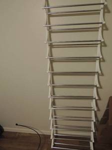 lot 123 image: White 11 shelf metal DOOR  shoe rack