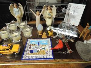 lot 126 image: WILLOW TREE - COURAGE 2 ceramic angels, 5 flower shaped candle holders, tile hot plate, lead crystal cross, willow tree angel, Cozumel Mexico shells in a bottle, LOVE sign, taxi cab and more