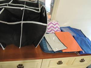 lot 135 image: School pencil bags, book bags, and 3 slot organizer