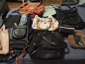 lot 140 image: Brown leather Roseti purse black purses no name Turquois purse and various others.