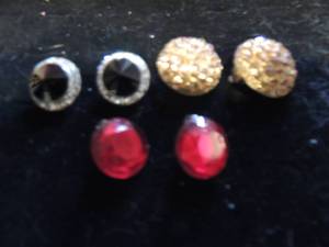 lot 243 image: 3 pair clip on earrings Black with silver, Gold crystal dangle and vintage red crystal