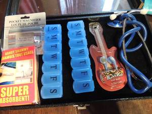 lot 233 image: Stethoscope, 2 weekly divided pill containers, pocket magnifier, handy shammy, ear buds NIP