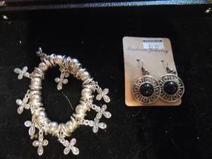 lot 229 image: Bangle bracelet with silver cross and Silver earring with amber stone NEW