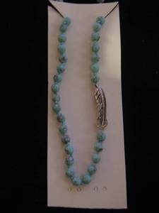 lot 213 image: Fossil necklace turquoise color beads with  silver feather clasp new 18p