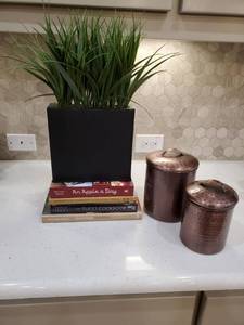 lot 54 image: Faux Greenery, Cookbooks & Metal Canisters