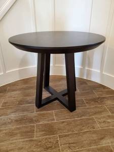 lot 82 image: Black Wood Round Table