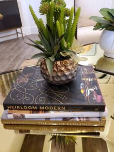 lot 95 image: Books with Faux Greenery