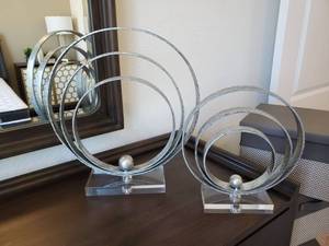 lot 162 image: Two Silver Tone Metal Circle Sculptures on Acrylic Bases