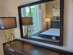 lot 165 image: Liberty Furniture Framed Beveled Mirror