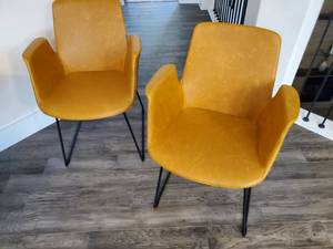lot 251 image: Four Tan Faux Leather Chairs on Metal Base