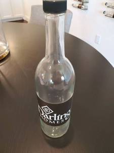 lot 295 image: 18 Darling Homes Labeled Glass Bottles