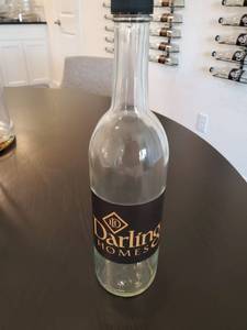 lot 298 image: 18 Darling Homes Labeled Glass Bottles