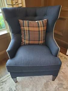 lot 280 image: Black Herringbone Wing Back Chair with Plaid Pillow