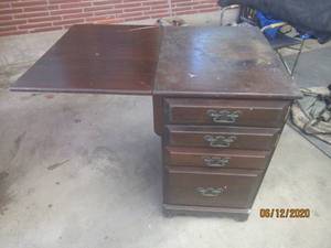 lot 65 image: VINTAGE CREDENZA WITH PULLOUT PRINTER TRAY ON WHEELS&nbsp&nbspLEAF UP 36L&nbspLEAF DOWN 18 L&nbsp&nbsp29 H