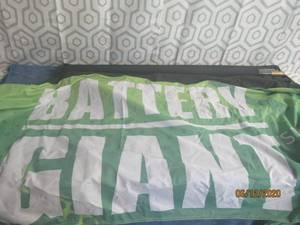 lot 97 image: BATTERY GIANT ADVERTISING BANNER IN CARRY BAG