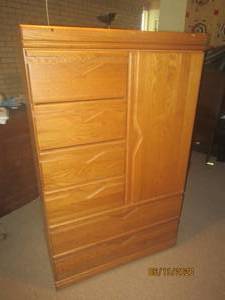lot 142 image: GENTLEMANS WARDROBE IN LIGHT OAK33 L X 18 X 54 H