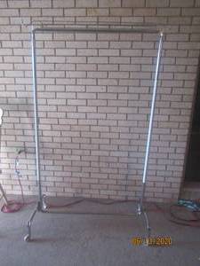 lot 154 image: ROLLING GARMENT RACK
