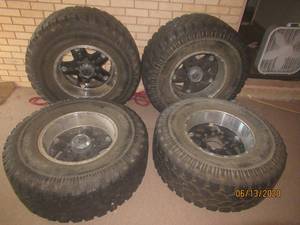 lot 155 image: 4 XTREME AT RIMS AND TIRES 8LUG 37X12 50RT18LT CAME OFF 2006 CHEVY SILVERADO ALL IN VERY GOOD CONDITION