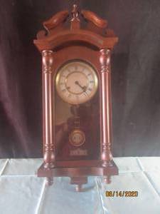 lot 230 image: HANDCRAFTED WALL CLOCK BY ROBERT AMMONS 1982