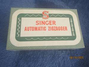 lot 483 image: VINTAGE SINGER ZIGZAGGER IN ORIGINAL BOX