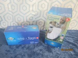 lot 518 image: PET SAFE STUBBORN DOG IN-GROUND FENCE AND A BOX OF PET SAFE WIRE AND FLAGS BOTH NEW IN BOX