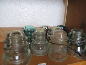 lot 37 image: 9 jar insulators, 2 blue, 7 clear all glass
