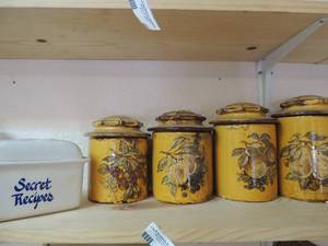 lot 47 image: Covered sugar bowls, sugar bowl, Flour bowl, rice bowl and a cookie bowl all with fruit decor