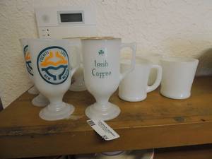 lot 55 image: 2 Cochiti lake white wine glasses, 4  Irish coffee glasses 3 fire king oven ware cups