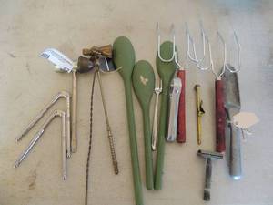 lot 62 image: 3 green soup spoons, 2 silver nut crackers and an ice cream scoop