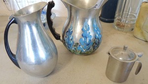 lot 64 image: Aluminum wearever water pot with flower and metal tea pitcher stainless steel creamer