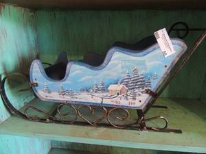 lot 66 image: Blue sled with Santas and heart metal decor