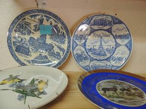 lot 69 image: blue and white Chicago plate and blue and white King island plate yellow bird plate plus blue and gold deer plate