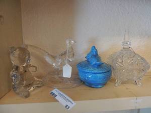 lot 83 image: Glass figurines-heavy teddy bear, blue trinket box with 2 blue doves on top, glass roadrunners, crystal covered candy dish