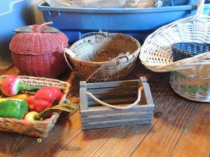lot 87 image: Various wicker baskets- apple basket with lid, wax veggies and wooden basket with handles