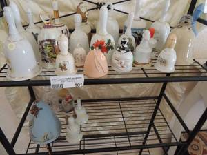 lot 101 image: Bell lot- crystal, porcelain, ceramic, ducks, Santa, dolls, states and teepee