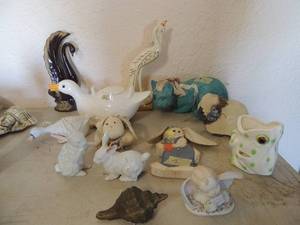 lot 112 image: Various animal dcor blue cat, ceramic frog pen holder, duck with ducklings, goose, 2 ceramic rabbits and more