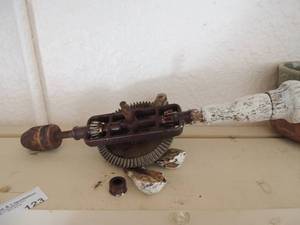 lot 123 image: Vintage hand crank drill 1 wooden handle broken pieces included