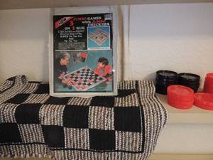 lot 138 image: Jumbo checkers game. Board is a rug