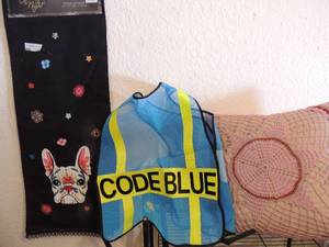 lot 141 image: Code blue vest hand knitted pink and red pillow, brand new Spooky night table runner