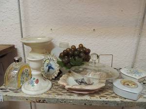 lot 10 image: Florida treasure craft, pink saucer, grande cannon, heart shaped trinket box, heart shaped powder holder, porcelain candle stand, and hand painted flower