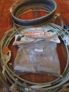 lot 154 image: Set of 2 breakaway stirrups NIB ,  Lasso and   a lasso glued together