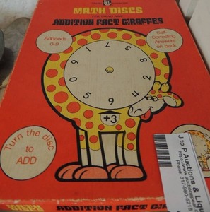 lot 231 image: Antique math discs and addition facts