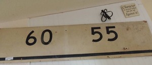 lot 246 image: Wall sign with the numbers  - 60 & 55  - size is 58 x 13