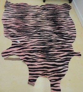 lot 259 image: Pink and black Faux Zebra skin rug leather 83x67